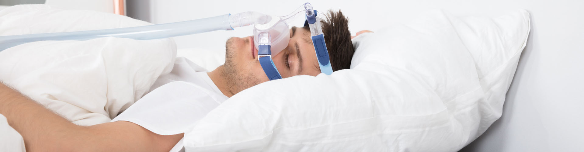 image of a person sleeping with cpap machine