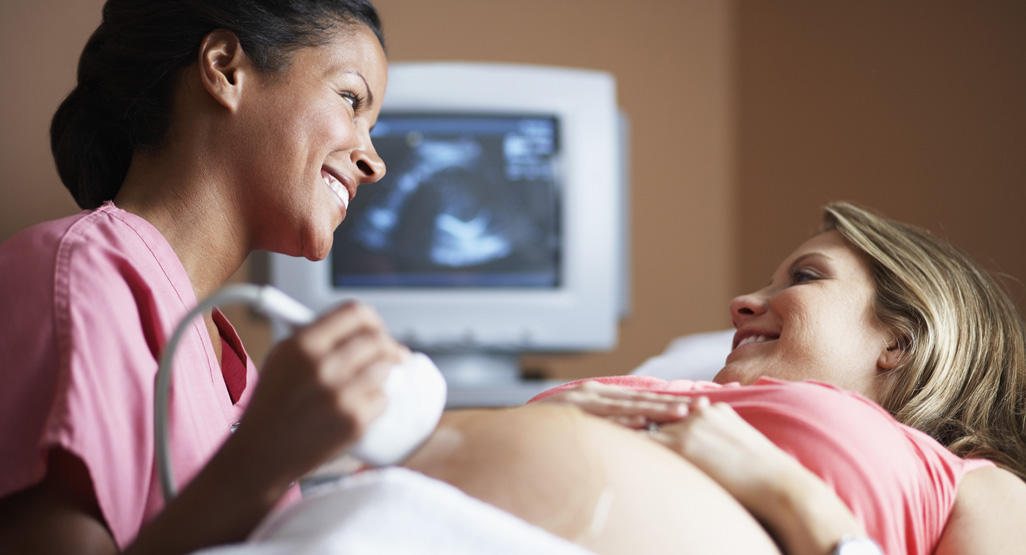 pregnant woman undergoing ultrasound